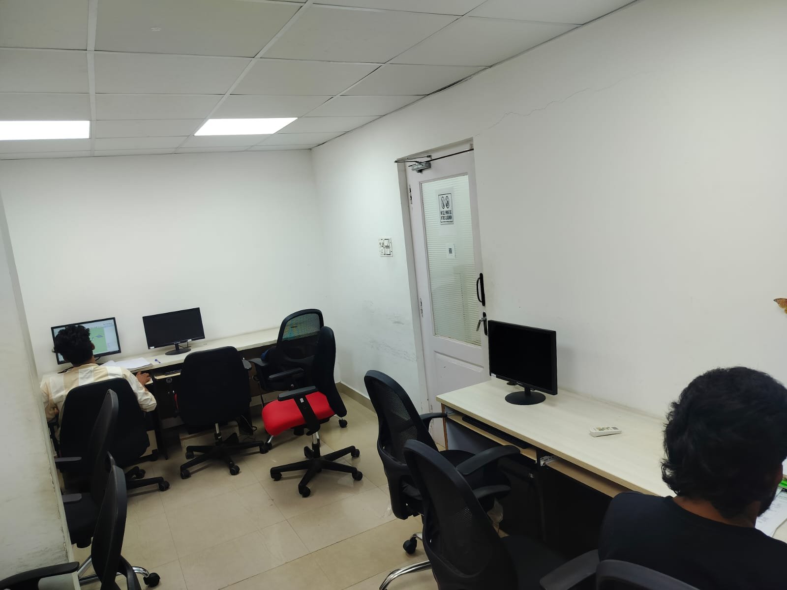 Students working at computer workstations at Techmaax Velachery